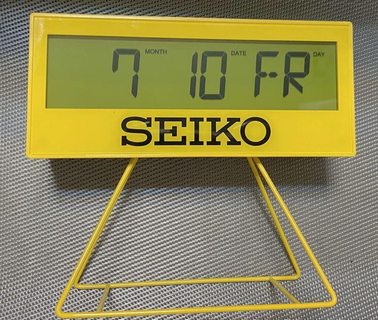 Réveil digital SEIKO QHL083YN en plastique jaune amovible